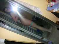 Amateur Babe Posing Naked With Camera
