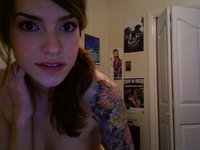 Pretty Tattooed Chick Teasing In These Pics