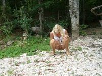 Hot blonde peeing outside