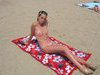 Amateur girl sunbathing topless