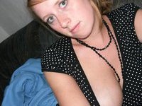 Nerdy amateur slut showing her tits