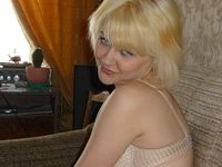 Amateur blonde posing at home
