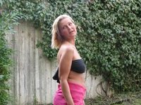 Blond amateur wife posing around house
