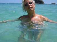 Big tit blonde MILF Gina at vacations