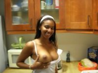 Beautiful ebony girl at kitchen