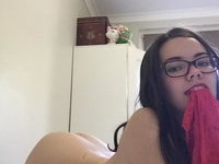 Geeky teen shows her natural tits