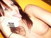 Hot brunette teen with phone