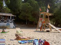 Teen blond girl on holiday at the beach
