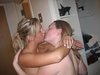 Two amateur GFs posing and kissing