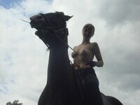 Topless amateur girl on horse