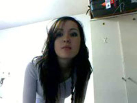 Play 'Hot brunette strips on webcam'