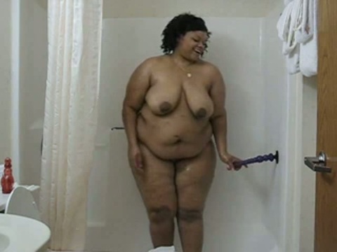 Play 'Big black babe taking a shower'