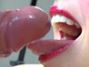 Teen with lipstick is doing sucking