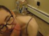 Teen in glasses licks dick and gets cum in mouth