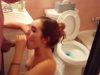 Redhead babe with tender nipples gives a blowjob in the toilet