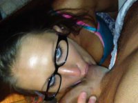 MILF with glasses sucks dick and balls