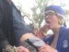 Blowjob from a busty blonde with glasses outdoors