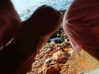 POV sex in the rocks near the sea