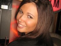 Brunette Chick Shows Off Party Outfits