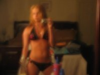 Cute blonde stripping