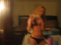 Cute blonde stripping