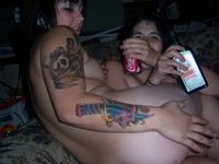 Kinky tattooed naked babes