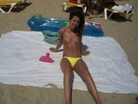 Horny tanned beach girl