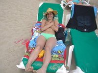 Horny tanned beach girl