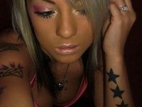 Tattooed Emo Chick Showing How Hot She Is