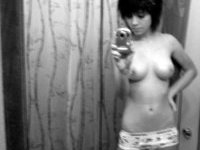 Topless Emo Chick Displays Different Hairdos