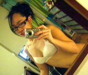 Cute Asian Takes A Boatload Of Pictures Of Herself