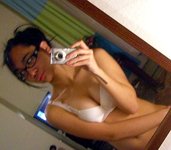Cute Asian Takes A Boatload Of Pictures Of Herself