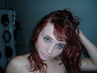 Cute Redhead Stripping