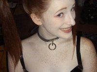 Gothic Red Headed Girl Flashes Her Tits
