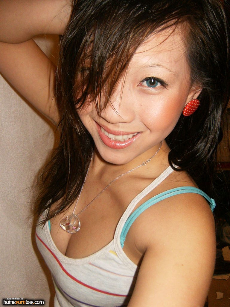 Lush Asian Sweetheart Posing Topless With Her Friend pic
