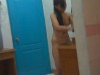 Malaysian Girl Getting Dressed In Blurry Photos