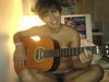 Naked guitar player