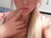 Cute tattooed blonde slut