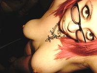 Chubby punk chick posing naked