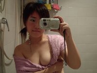 Cute asian teen in bathroom