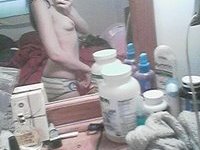 Emo slut shows her tits