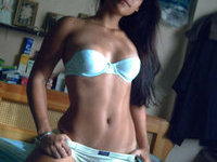 Wet Adrianna washing herself