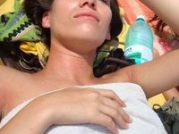 Pretty Chick Topless Sunbathiing