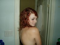 Redhead teen stripping