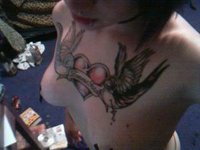 Punk Girl Showing Off Her Tattooed Tits