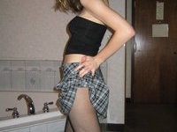 Kinky schoolgirl posing