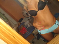 Blonde Alie stripping
