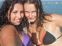 Two girls showing off
