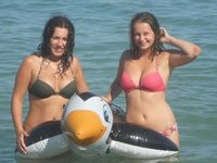 Two girls showing off