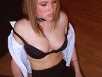 Blonde business lady stripping